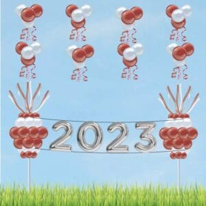 Our Graduation Decor Package 3 includes two balloon columns, eight balloon topiary clusters, and four 3' mylar balloons.