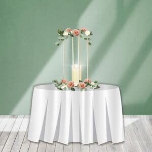 Gold Centerpiece Riser with Flowers and Flameless Candle Rental. This cute centerpiece is decorated with flowers and is perfect for any venue. Most venues don't allow real candles.... this is your solution to get the perfect glowing look without the worry.