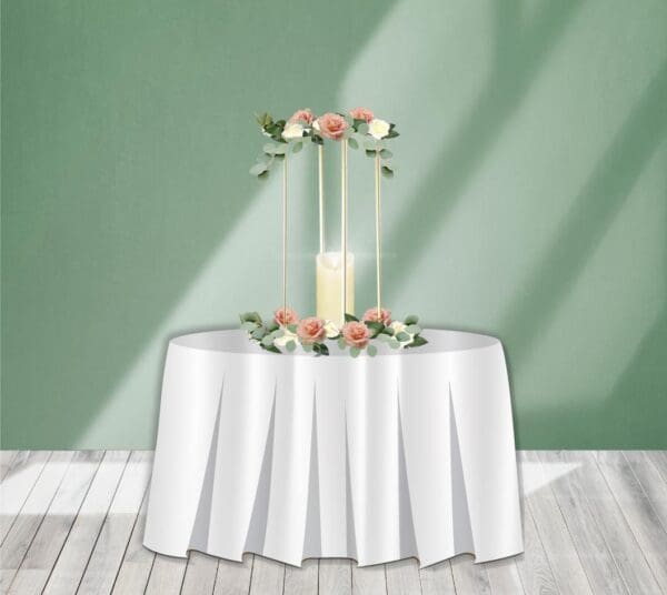 Gold Centerpiece Riser with Flowers and Flameless Candle Rental. This cute centerpiece is decorated with flowers and is perfect for any venue. Most venues don't allow real candles.... this is your solution to get the perfect glowing look without the worry.