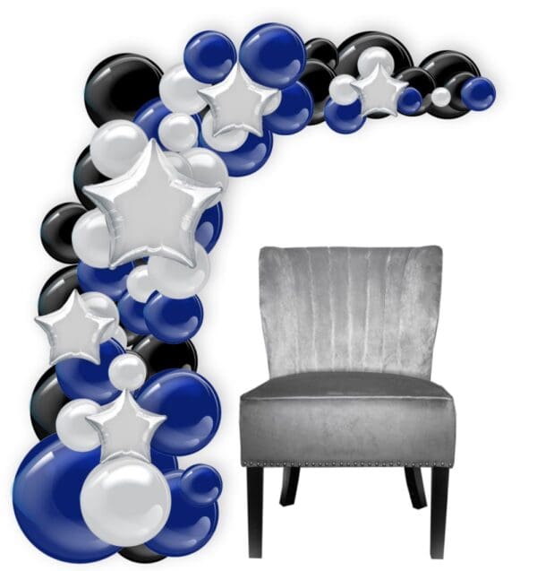 Organic balloon arch with guest of honor chair.