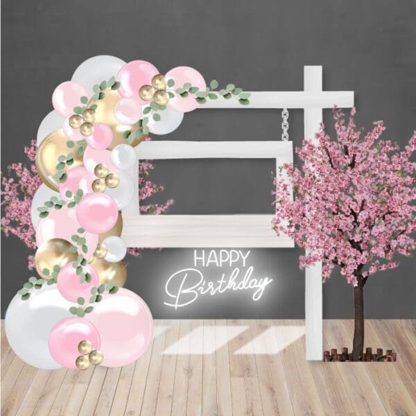 Wooden-photo-frame-neon-sign-with-organic-balloon-arch-and-cherry-blossom-trees