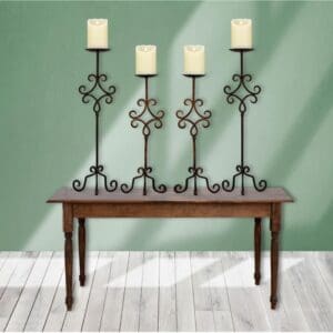 Our Wrought Iron Candle Holders come in 2 different sizes, quantity 4, have a chargeable flameless candle, and are the perfect accent elements to add to any design decor!