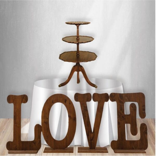 Our Rustic Cake Stand is a beautiful way to display a cake, cupcakes, centerpieces, flowers, etc.  Rustic LOVE letters.